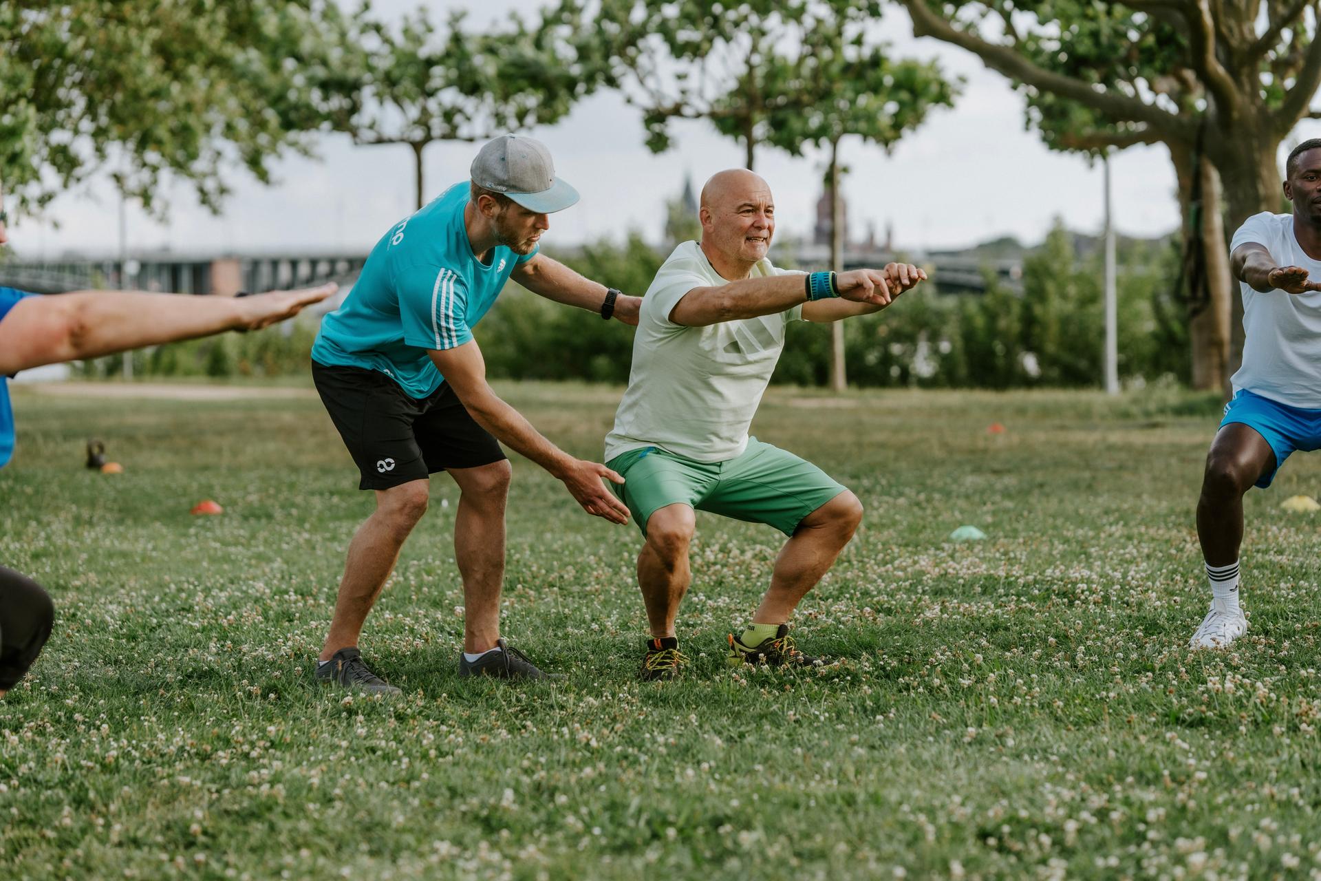 Coaching in der Kniebeuge mit Personal Trainer