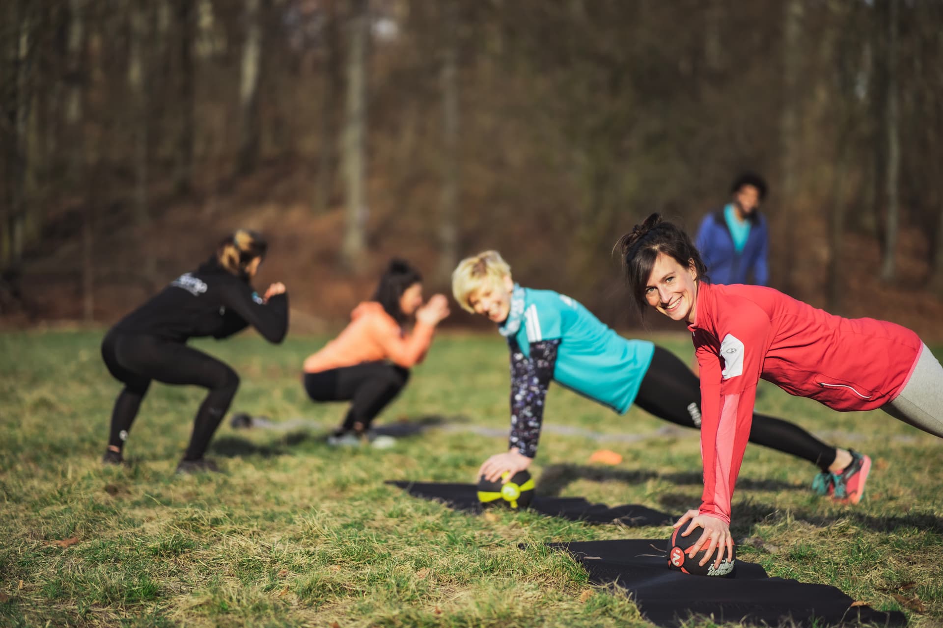 Eine Gruppe Trainierende bei Original Bootcamp